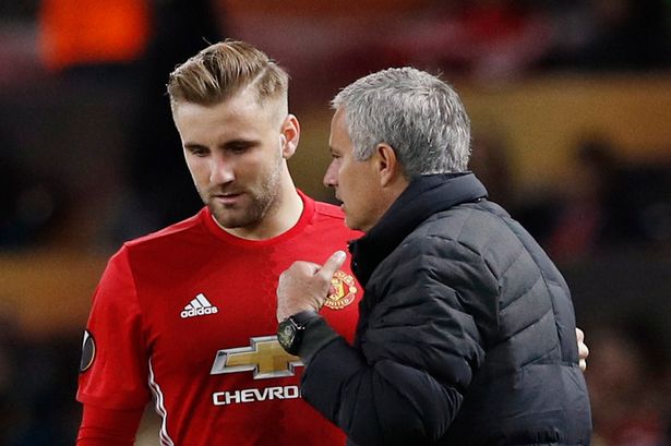 Jose Mourinho giving Luke Shaw instructions